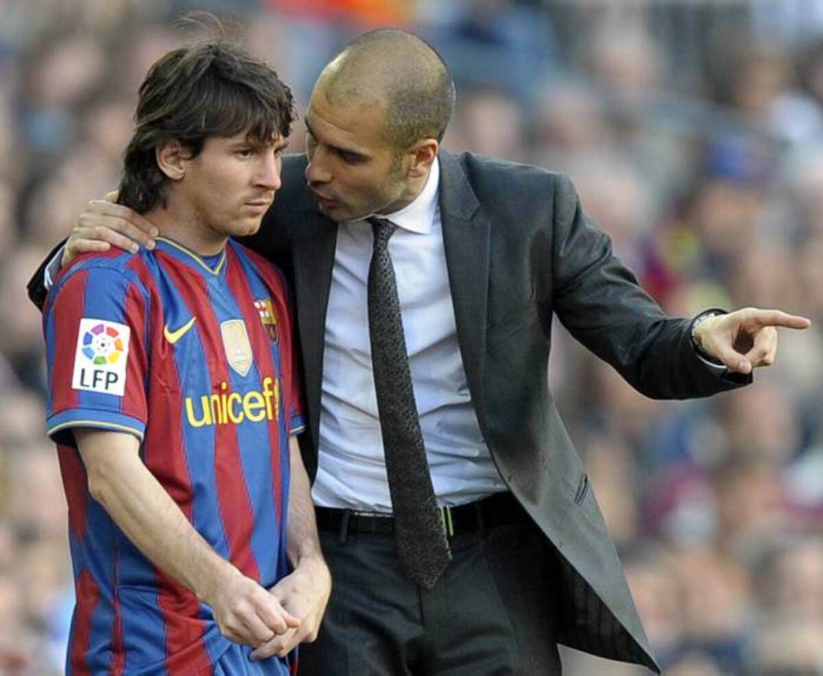Lionel Messi junto a Pep Guardiola. AFP LLUIS GENE