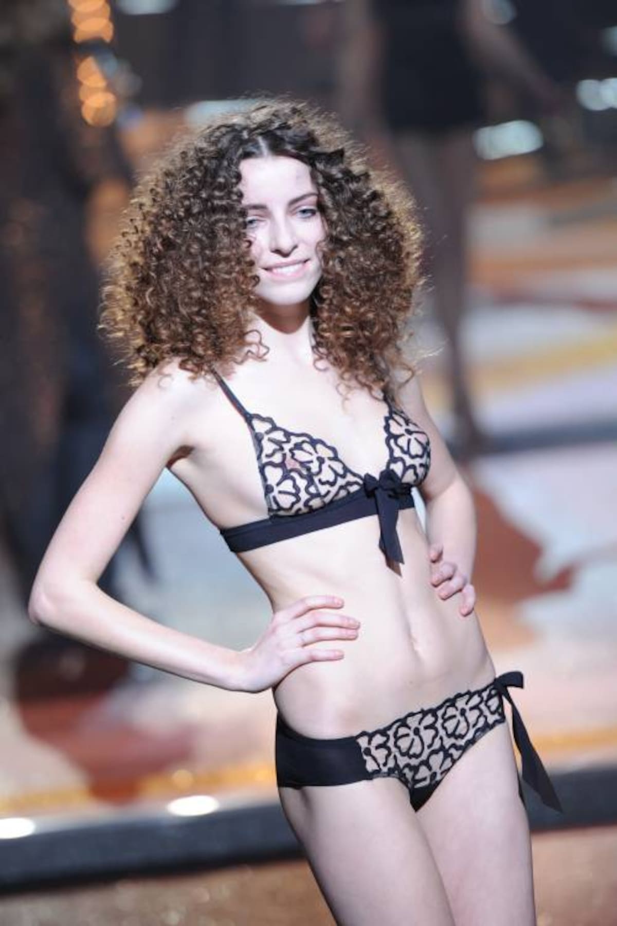 A model presents lingerie creations by Russian former model Natalia Vodianova during the Spring-Summer 2012 Etam Lingerie Collection Show on January 23, 2012 in Paris. AFP PHOTO / MIGUEL MEDINA