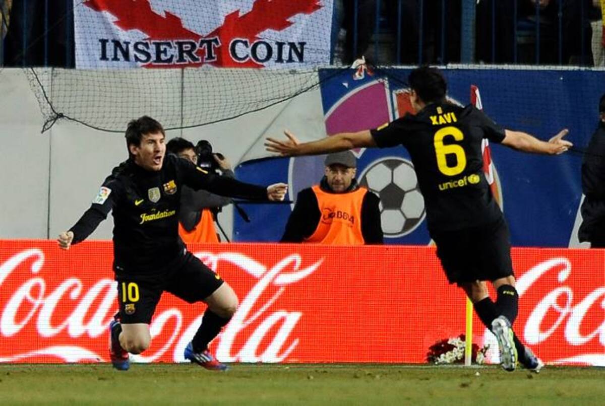 Lionel Messi y Xavi Hernández estarían bien cerca de visitar a Cartagena en el mes de junio. AP