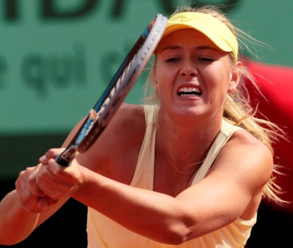 Russia's Maria Sharapova returns the ball to France's Caroline Garcia during their Women's second round match in the French Open tennis championship at the Roland Garros stadium, on May 26, 2011, in Paris. AFP PHOTO / JACQUES DEMARTHON