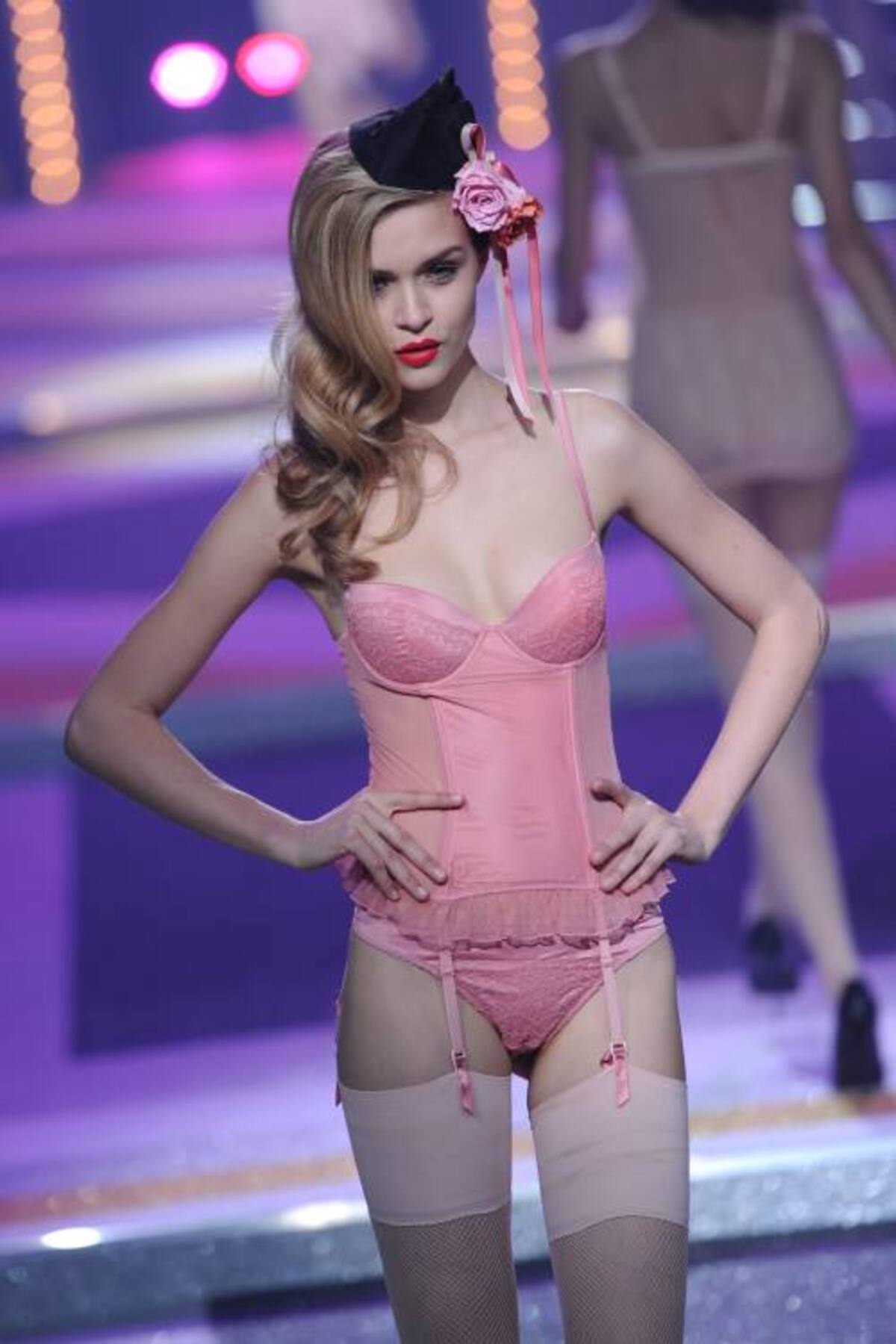 A model presents lingerie creations by Russian former model Natalia Vodianova during the Spring-Summer 2012 Etam Lingerie Collection Show on January 23, 2012 in Paris. AFP PHOTO / MIGUEL MEDINA
