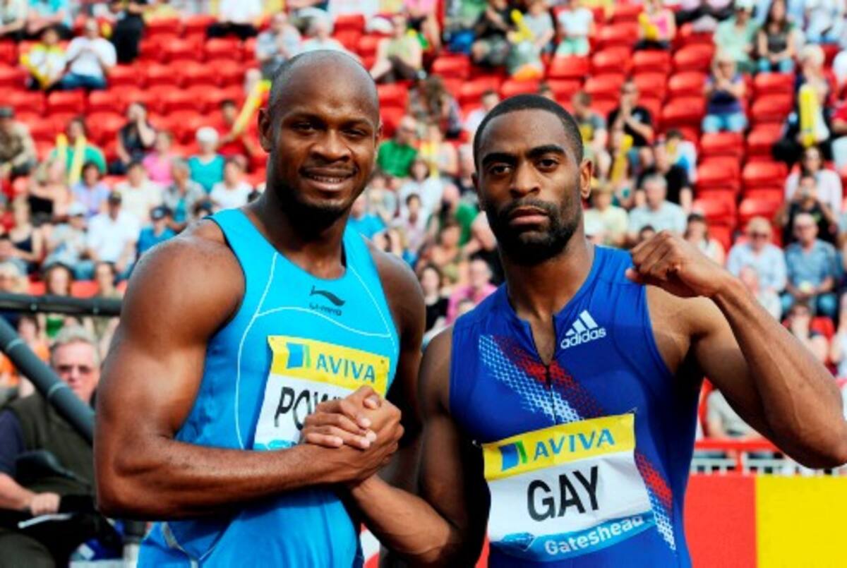 Debido a lesiones, Asafa Powell (izq.), Tyson Gay (der.) no podrán correr los 100 metros en el Mundial de atletismo de Daegu, Corea del Sur. AP Owen Humphreys