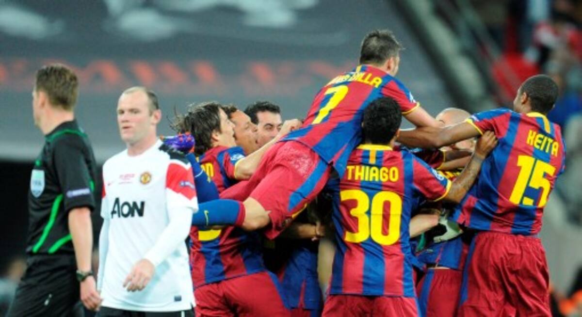 El Barcelona le gana 3-1 al Manchester y se corona campeón de la Copa de Campeones de Europa en el mítico estadio Estadio de Wembley, en Londres. Con alegría desbordante celebran los jugares del elenco español. FRANCK FIFE-AFP