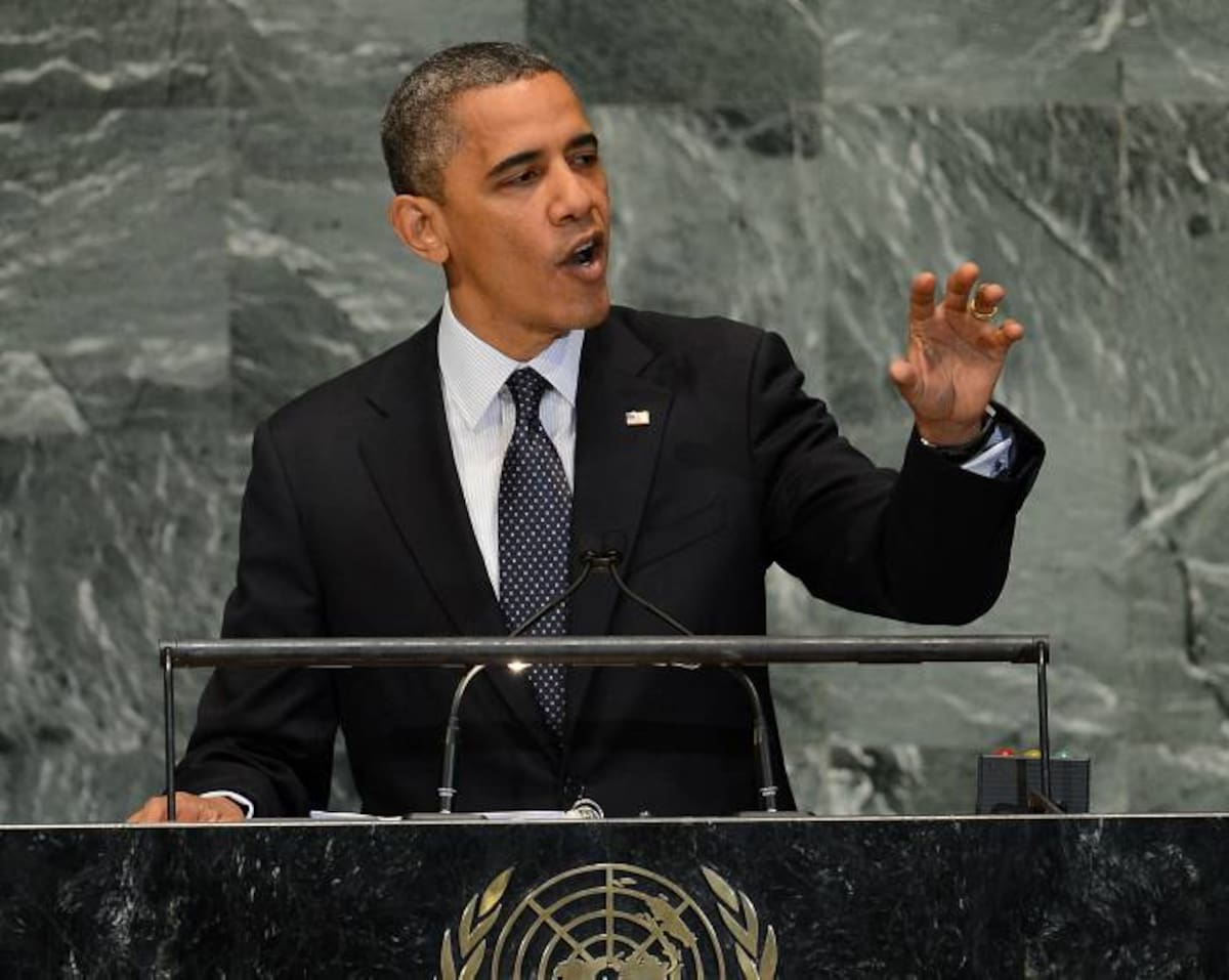 US President Barack Obama addresses the 67th UN General Assembly at the United Nations headquarters in New York, September 25, 2012. Obama on Tuesday demanded "sanctions and consequences" for atrocities in Syria and said President Bashar al-Assad's rule must come to an end. "The future must not belong to a dictator who massacres his people," Obama told the UN General Assembly in a keynote address. AFP PHOTO/Emmanuel DUNAND