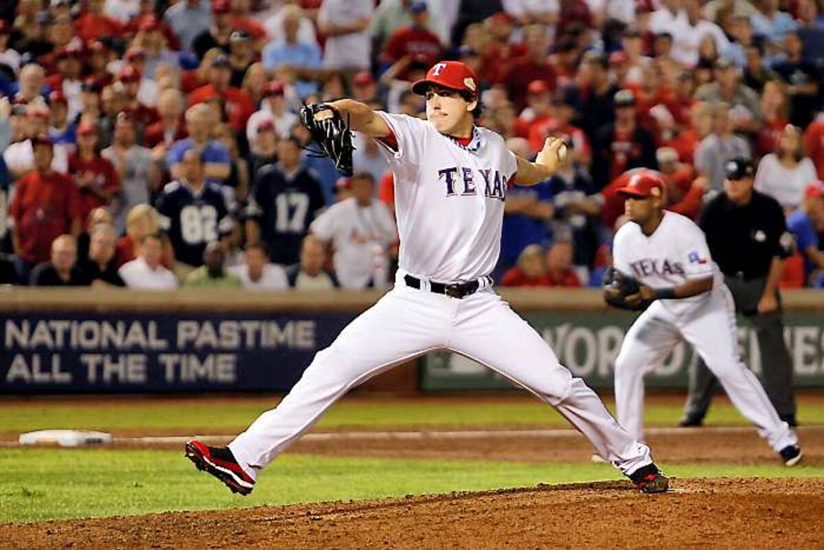 El pitcher Derek Holland fue dictatorial en el montículo por los Rangers. AFP