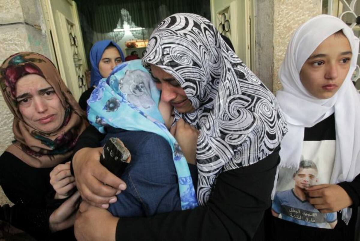 Los palestinos lloran a sus muertos. AFP HAZEM BADER