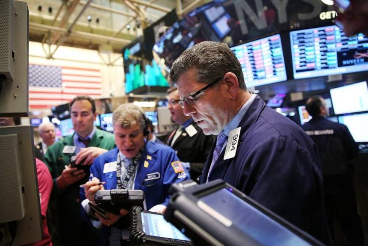 El Dow Jones crecía 134 unidades (0,9%) para quedar en 14.964 y el tecnológico Nasdaq crecía 37 unidades (1%) para quedar en 3.378. AFP SPENCER PLATT
