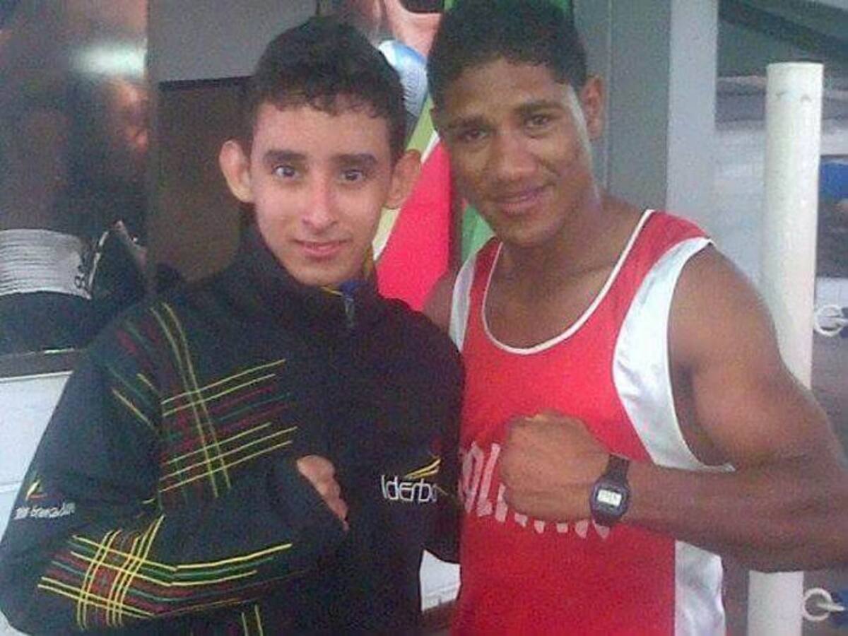 Andres felipe Amador con el boxeador Miguel Marriaga. Cortesía