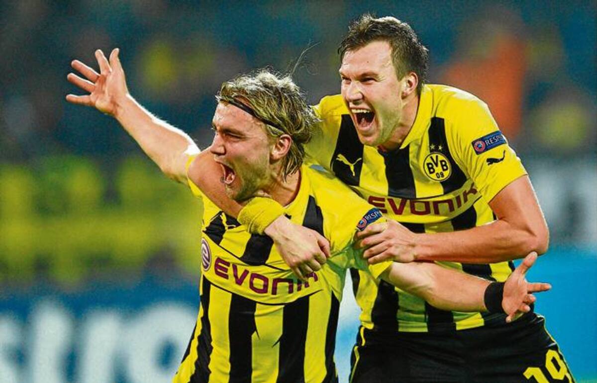 Marcel Schmelzer celebra el tanto de la victoria para el equipo alemán.