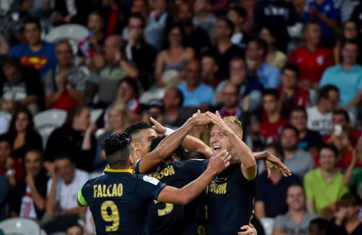 Jugadores del Mónaco celebran uno de los goles del partido. AFP PHILIPPE HUGUEN