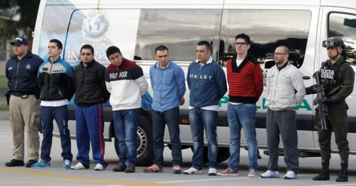 Los siete colombianos acusados del crimen de James Terry Watson, momentos previos a ser extraditados a Estados Unidos. Archivo.