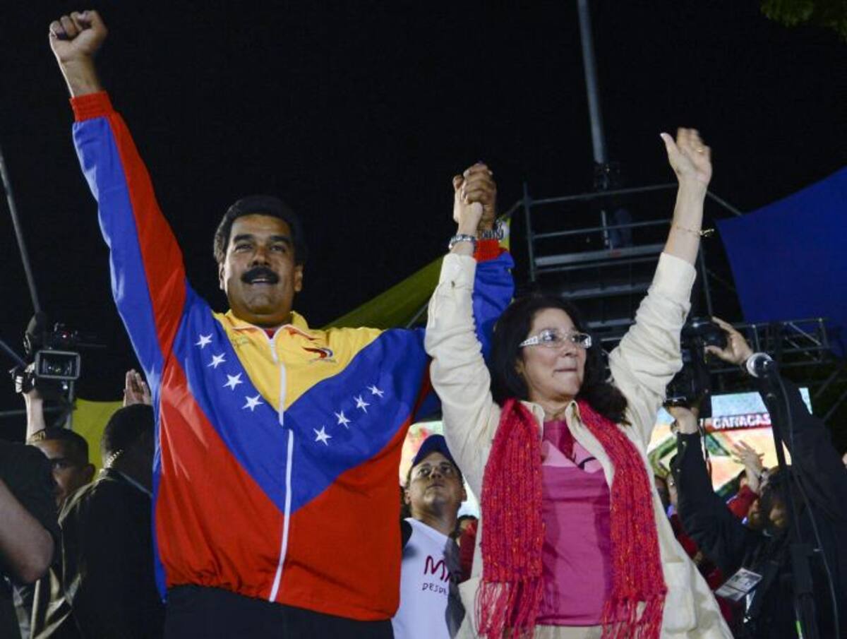 Nicolás Maduro junto Cilia Flores. AFP JUAN BARRETO
