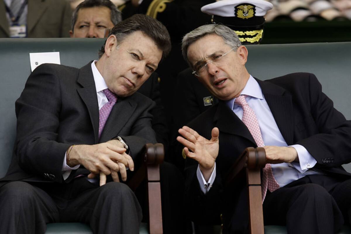 Juan Manuel Santos y Álvaro Uribe. COLPRENSA