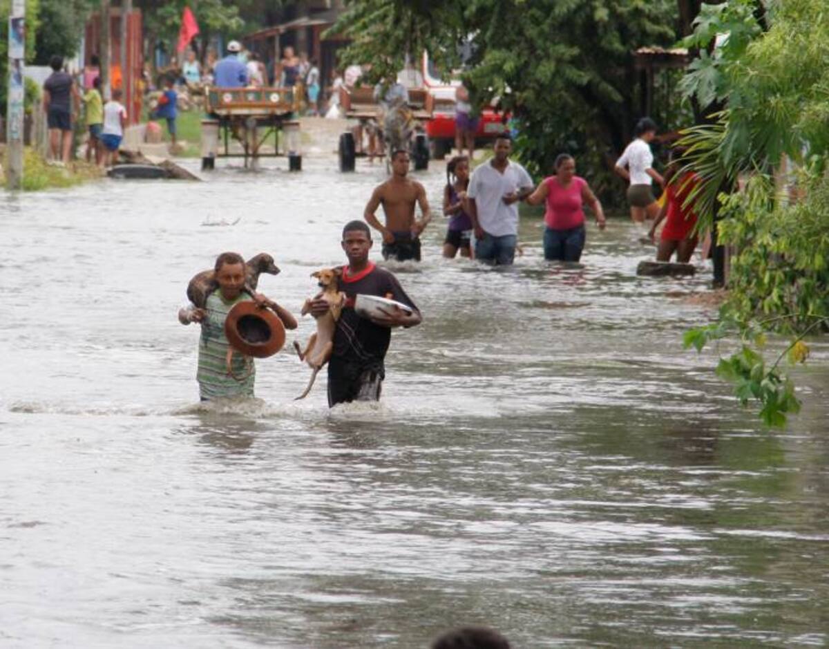 Cartagena, Kenia y Filipinas tienen en común enfrentar las perdidas materiales que dejan las arremetidas del cambio climático. La foto muestra las inundaciones en E Pozón, en el 2011. ARCHIVO