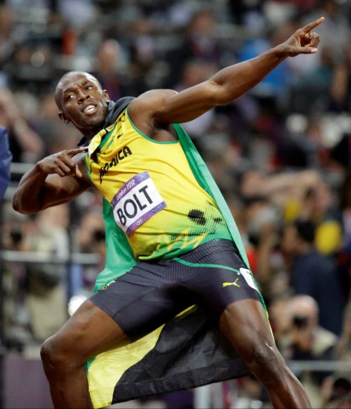 Jamaica Usain Bolt celebra después de ganar la medalla de oro en 100 de los hombres AP Lee Jin-man