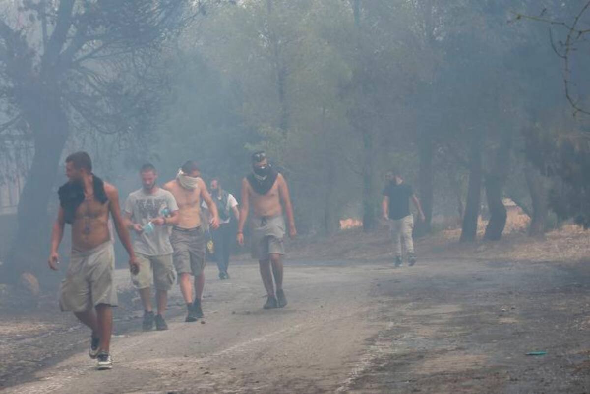 Hay riesgos en la salud. El aire seguirá tóxico durante mucho tiempo después de los incendios. // EFE