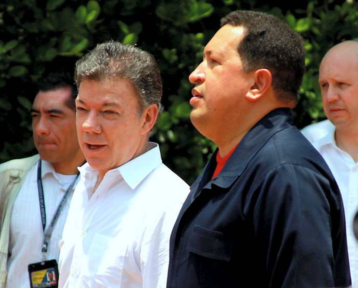 Juan Manuel Santos y Hugo Chávez. GERMÁN GÓMEZ POLO - EL UNIVERSAL