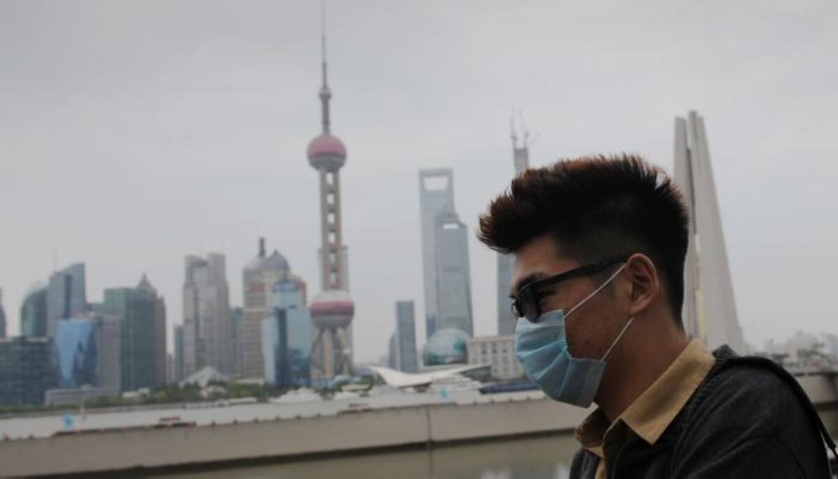 Los chinos implementaron el uso de tapabocas para protegerse del virus. AFP PETER PARKS