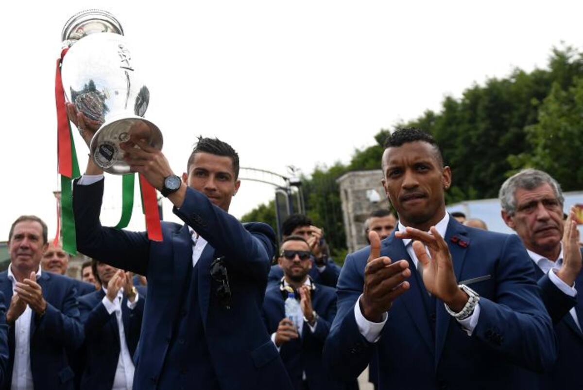 Los jugadores de Portugal celebran la victoria. AFP FRANCISCO LEONG