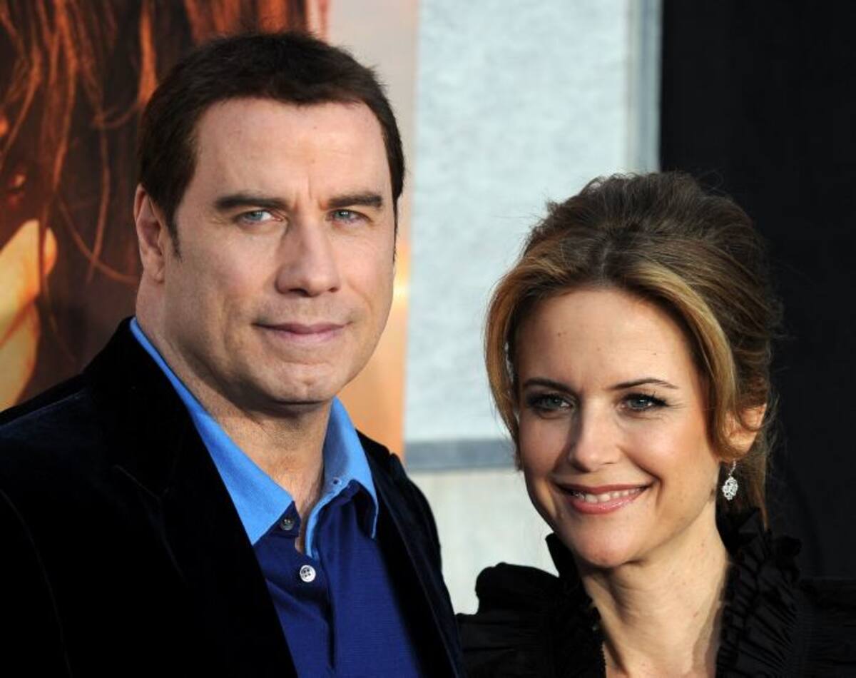 John Travolta y su esposa Kelly Preston. AFP GABRIEL BOUYS