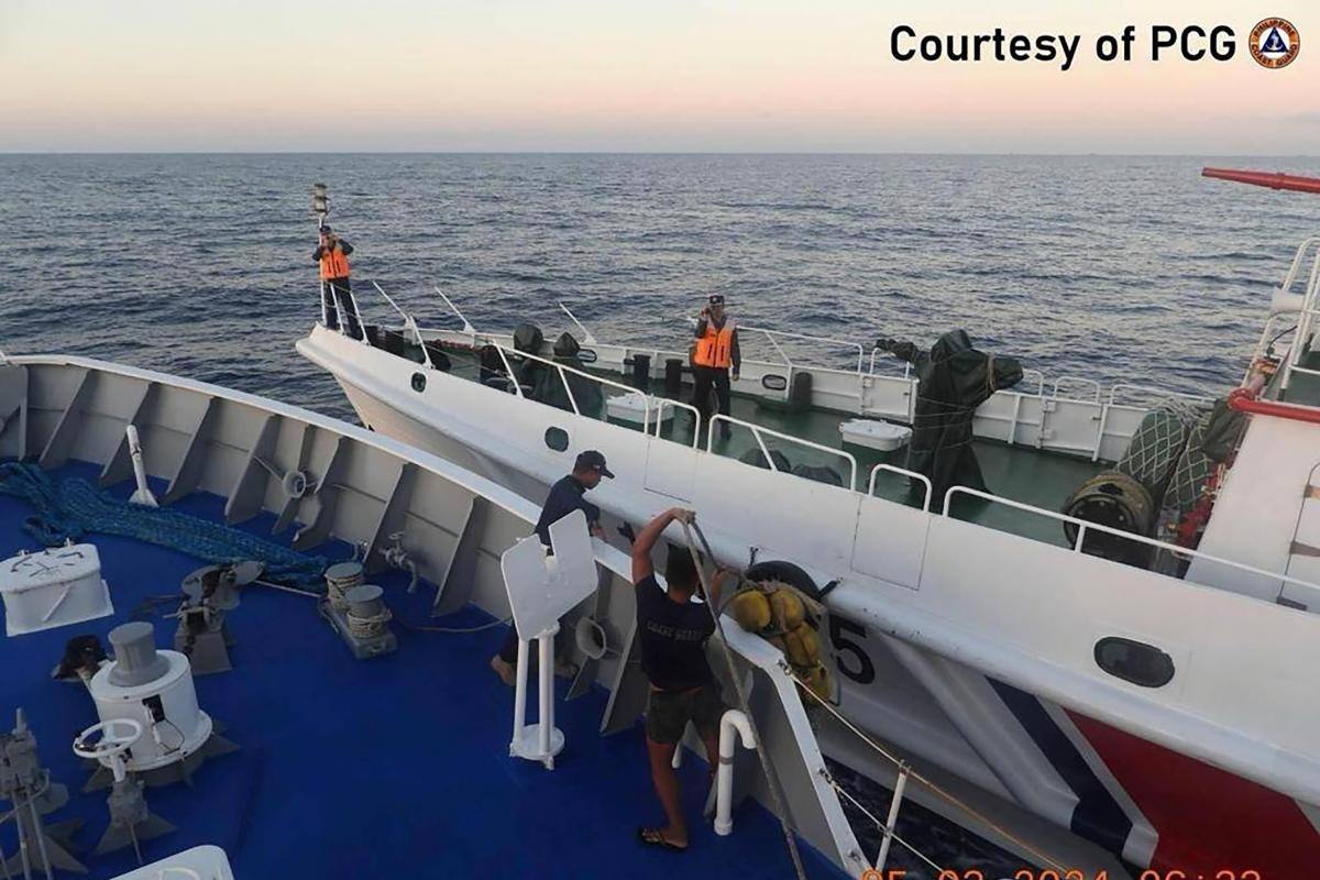 Choque de barcos de Filipinas y China deja 4 personas heridas