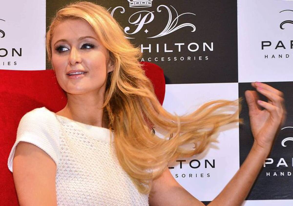 La polémica celebridad estadounidense, Paris Hilton, visitó Colombia para inaugurar una de sus tiendas en la capital del país. AFP LUIS ACOSTA