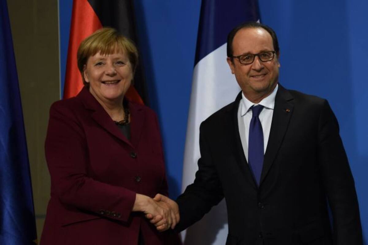 El presidente francés y la canciller alemana, François Hollande y Angela Merkel. AFP STEPHANE DE SAKUTIN
