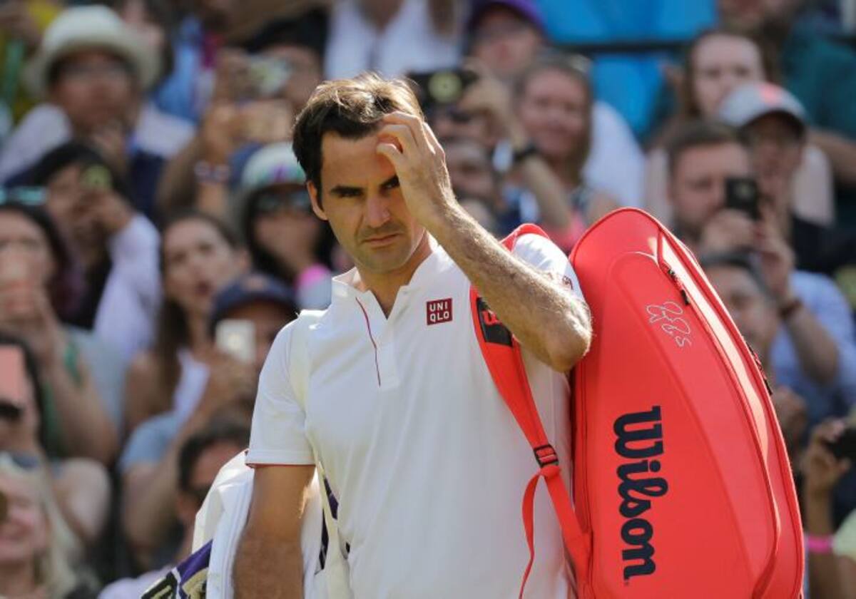 Roger Federer no podrá defender el título en Wimbledon. AP Ben Curtis