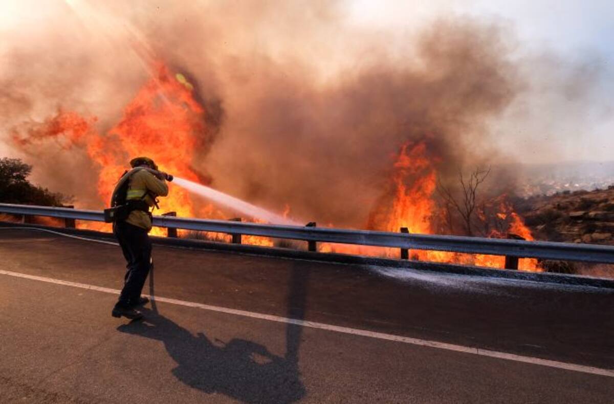 Más de 4.500 bomberos luchan contra las llamas en esta zona. AP Marcio Jose Sanchez
