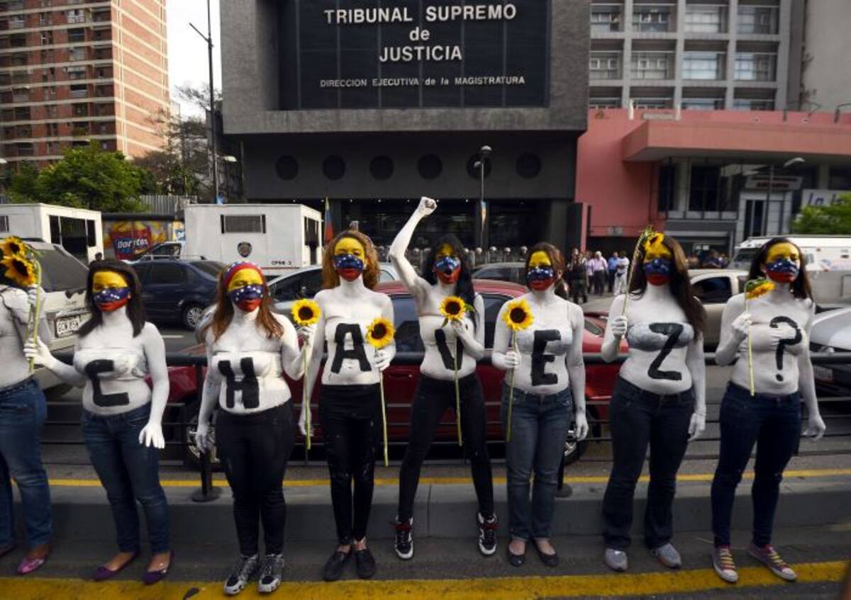 Manifestantes de la oposición demandan que el gobierno revelar más sobre la salud de la enfermedad de Hugo Chávez AFP JUAN BARRETO