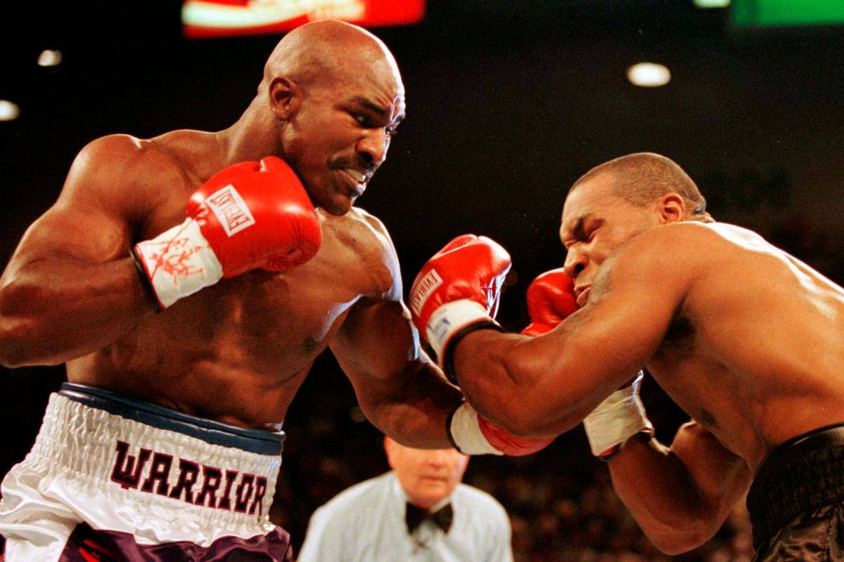 Holyfield reta a Tyson: firma el contrato y sube al cuadrilátero