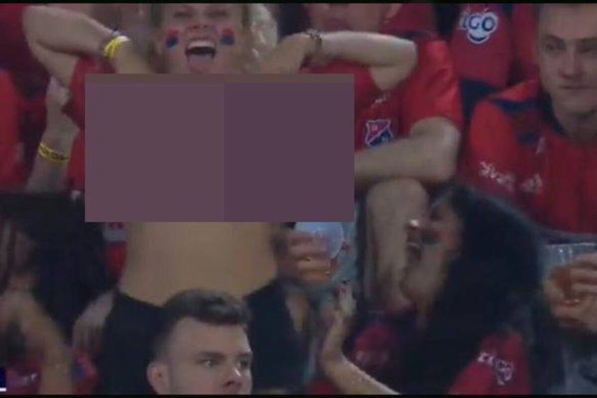 La hincha que se alzó la blusa en un partido y puso en aprietos a Win Sports