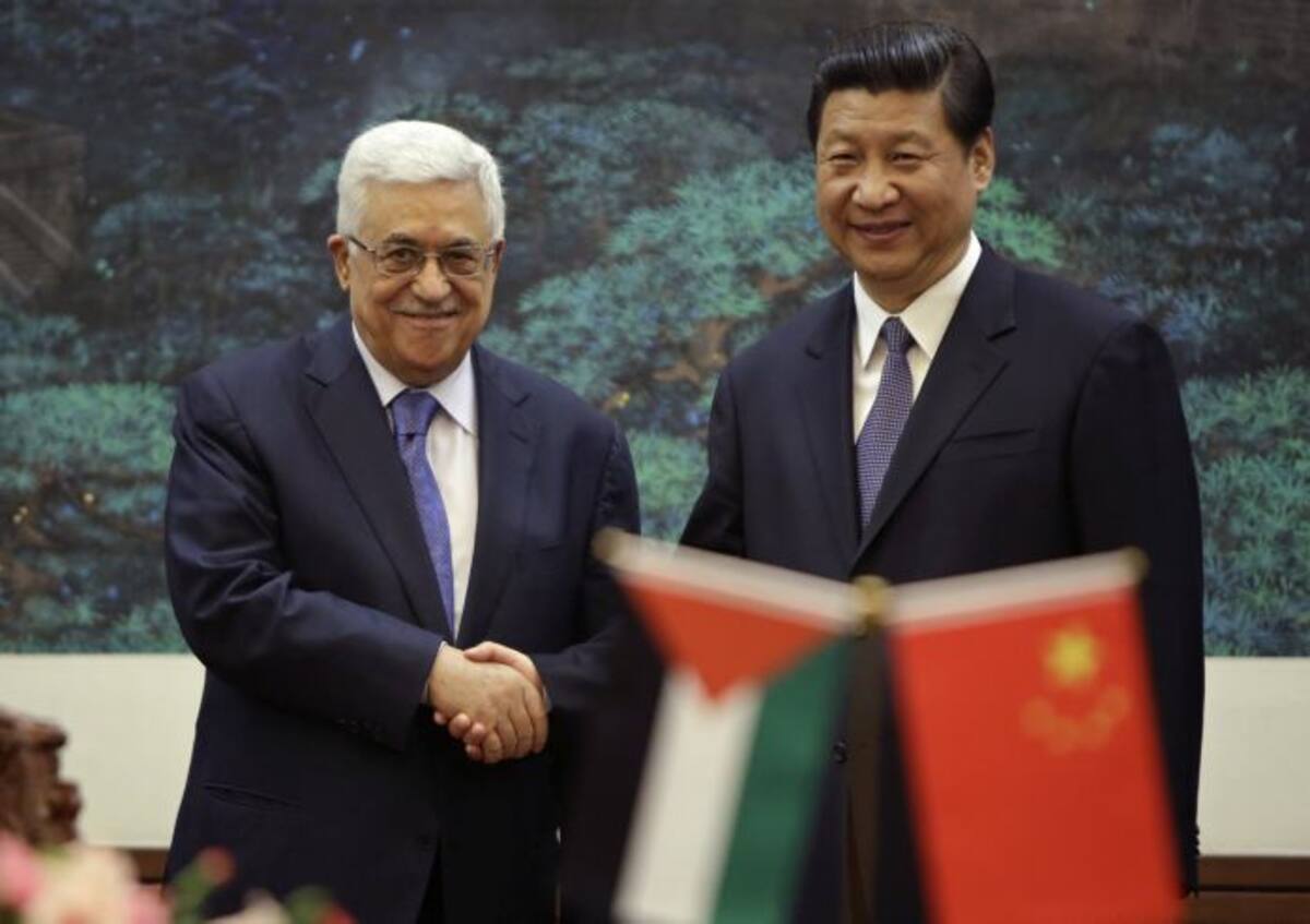 El presidente palestino, Mahmud Abas, visitó en Pekín a su homólogo chino, Xi Jinping. AFP JASON LEE