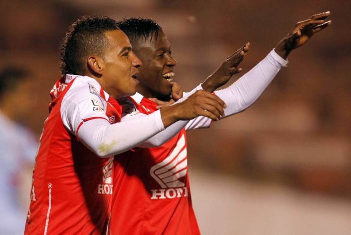 Wílder Medina y Jeferson Cuero celebran los goles cardenales AP Martin Mejia