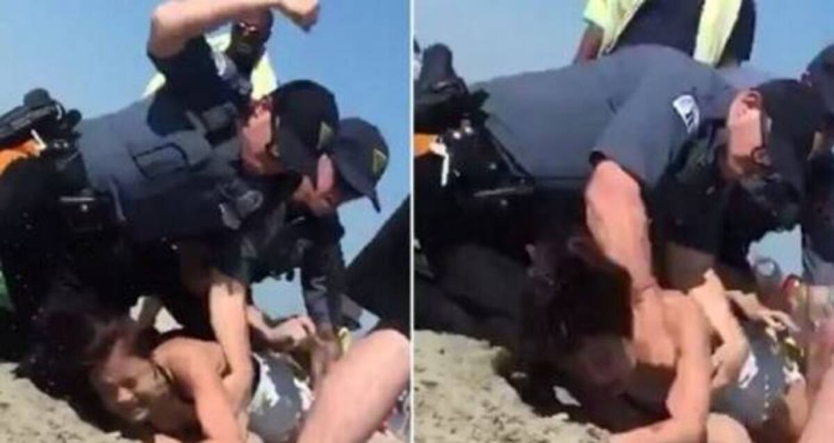 Captura del video que muestra a un policía golpeando a Emily Weinman. Captura
