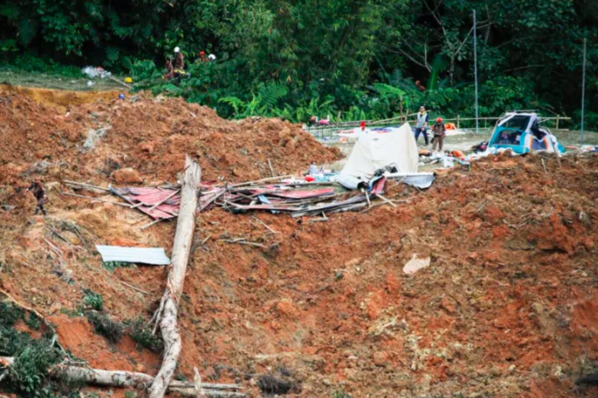 Suben a 24 los muertos por avalancha en campin malasio, con 9 desaparecidos
