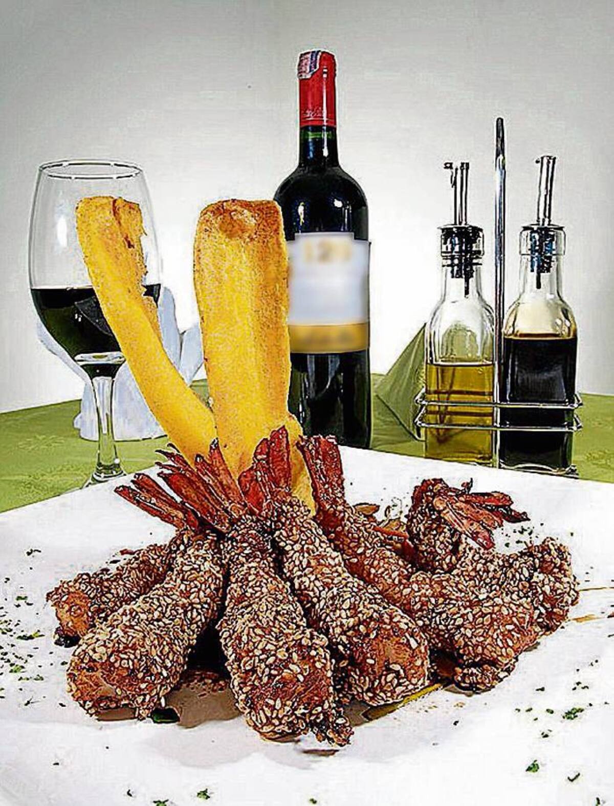 Langostinos ginger. Langostinos rebosados con jengibre y ajonjolí, acompañados con vegetales al wok bañados con salsa teriyaki.