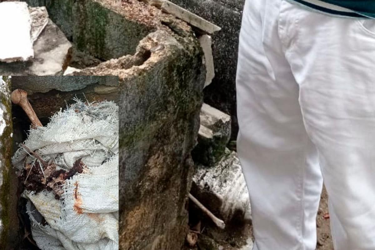 ¡De terror! Huesos afuera de las tumbas en el cementerio de Manga