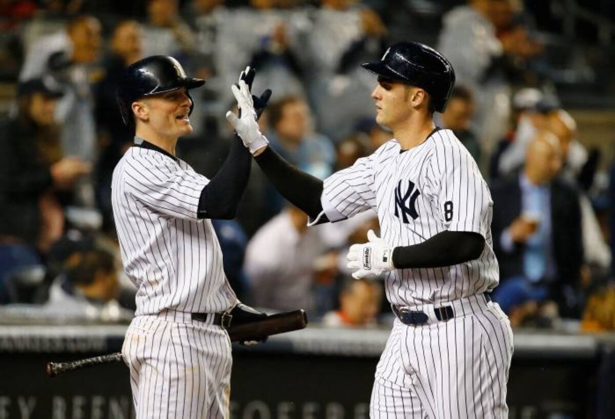 Los jugadores de los Yankees celebran el pase. AFP AL BELLO