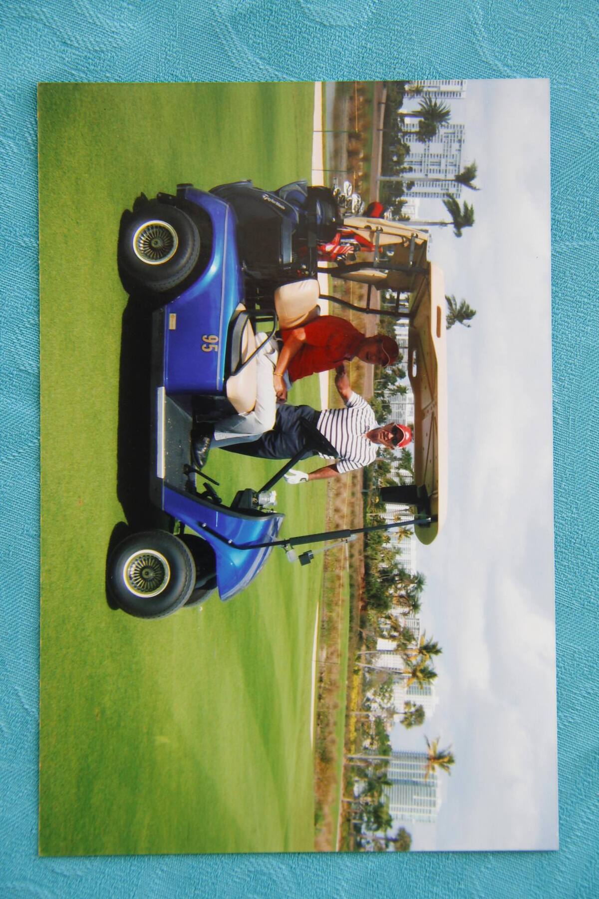 Cristóbal y uno de sus tres hijos, Juan Carlos López, en un campo de golf de Miami.