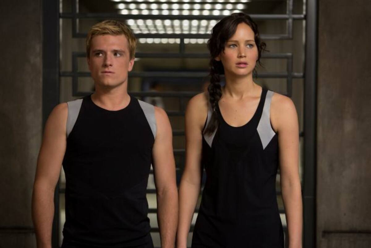 Josh Hutcherson y Jennifer Lawrence en una de las escenas de 'Los Juegos del Hambre'.