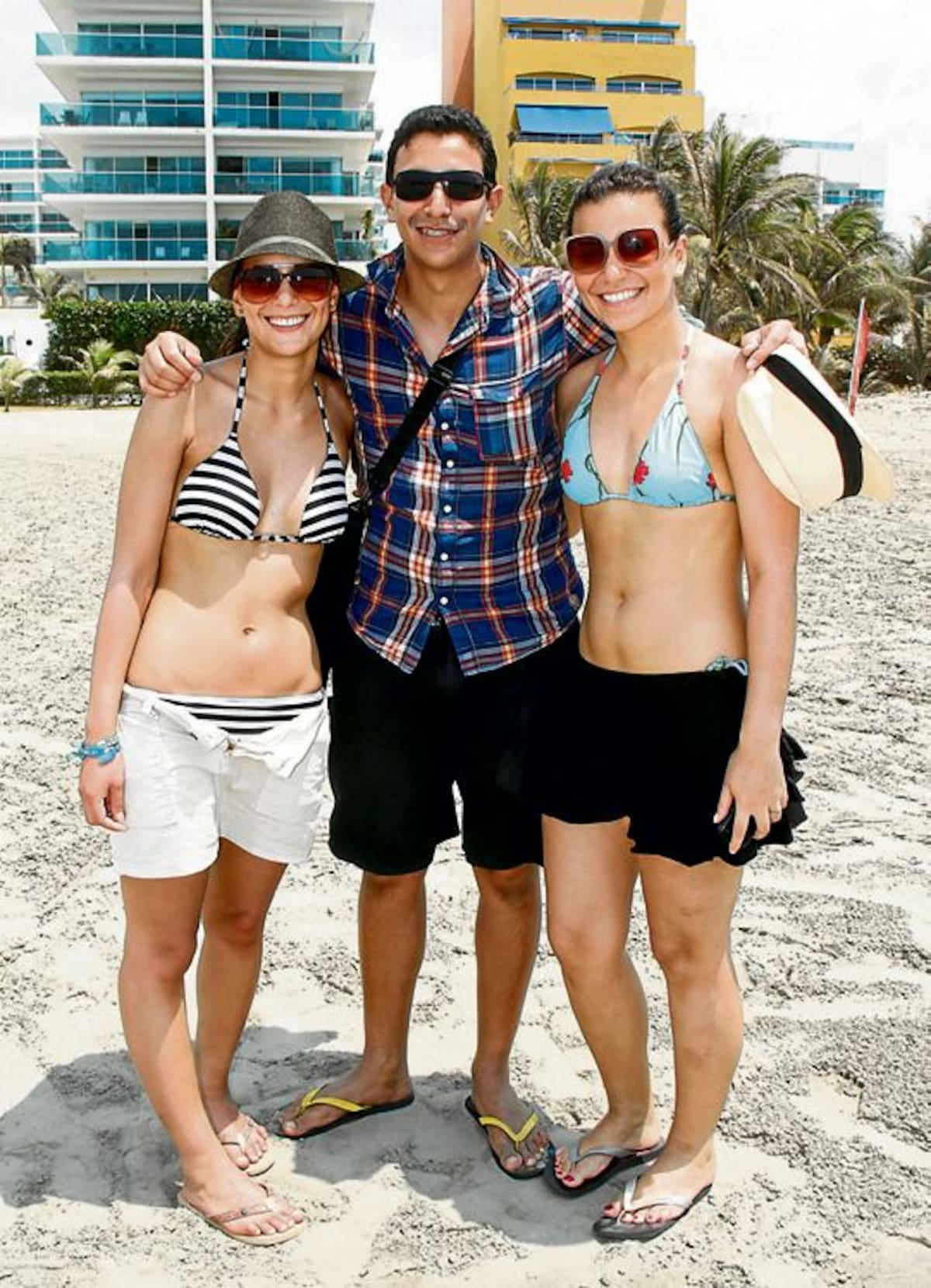 Lina, Hernando y Laura Prias.