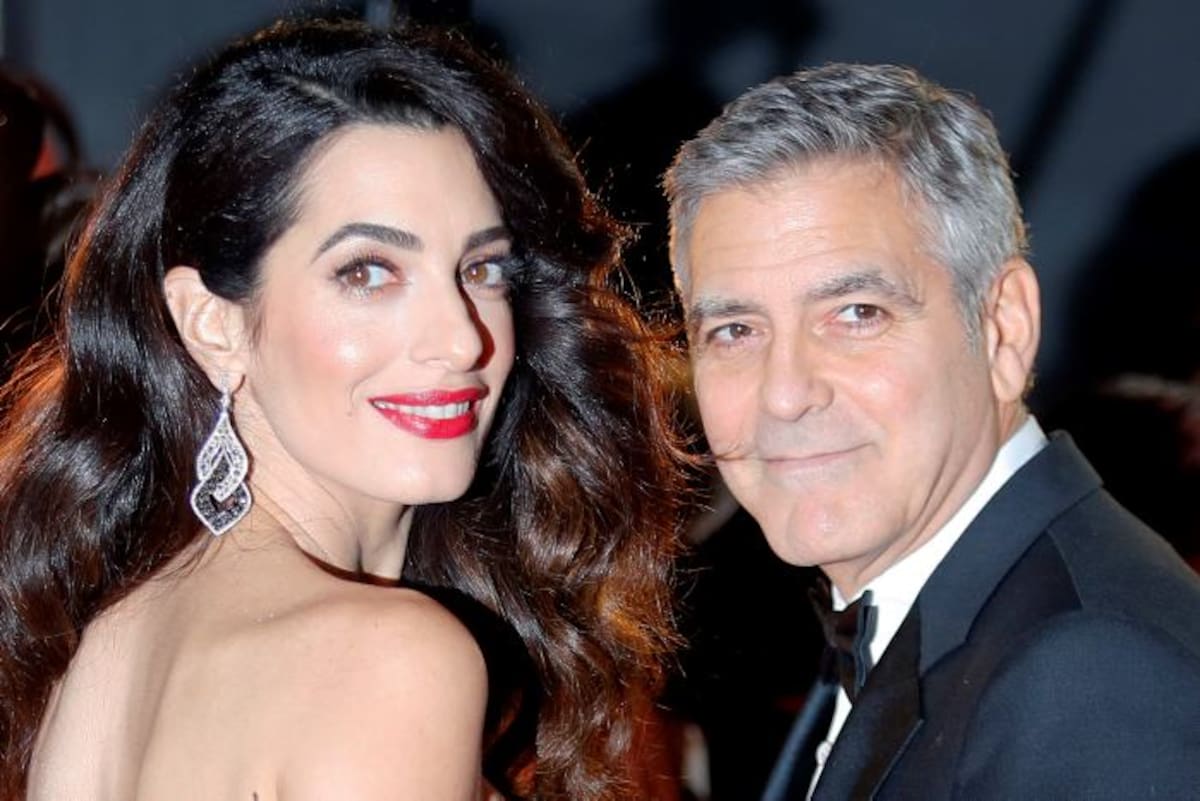 George Clooney y su esposa Amal. ARCHIVO