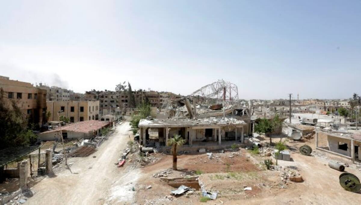 Edificios en ruinas en la localidad de Duma, en Siria. EFE YOUSSEF BADAWI