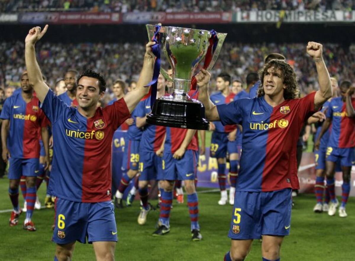 Xavi Hernández celebra uno de sus títulos con Barcelona. AFP JOSEP LAGO