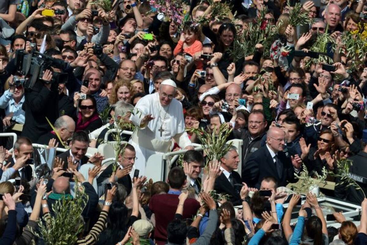 El Domingo de Ramos recuerda la entrada de Jesús en medio de multitudes en Jerusalén. AP AFP