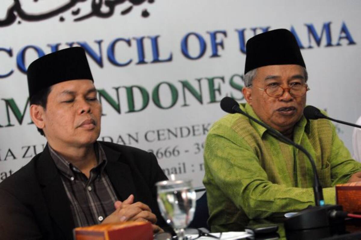 Muhyidin Junaedi y Amirsyah Tambunan, miembros del Consejo Indonesio de Ulema. AFP DA ROSSA