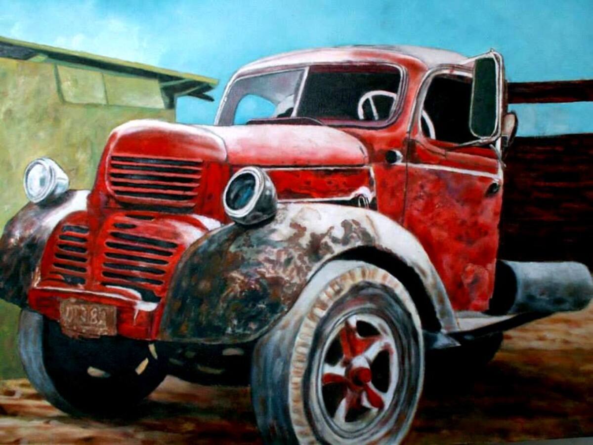 El artista prefiere para sus camiones, el azul y el rojo CORTESÍA