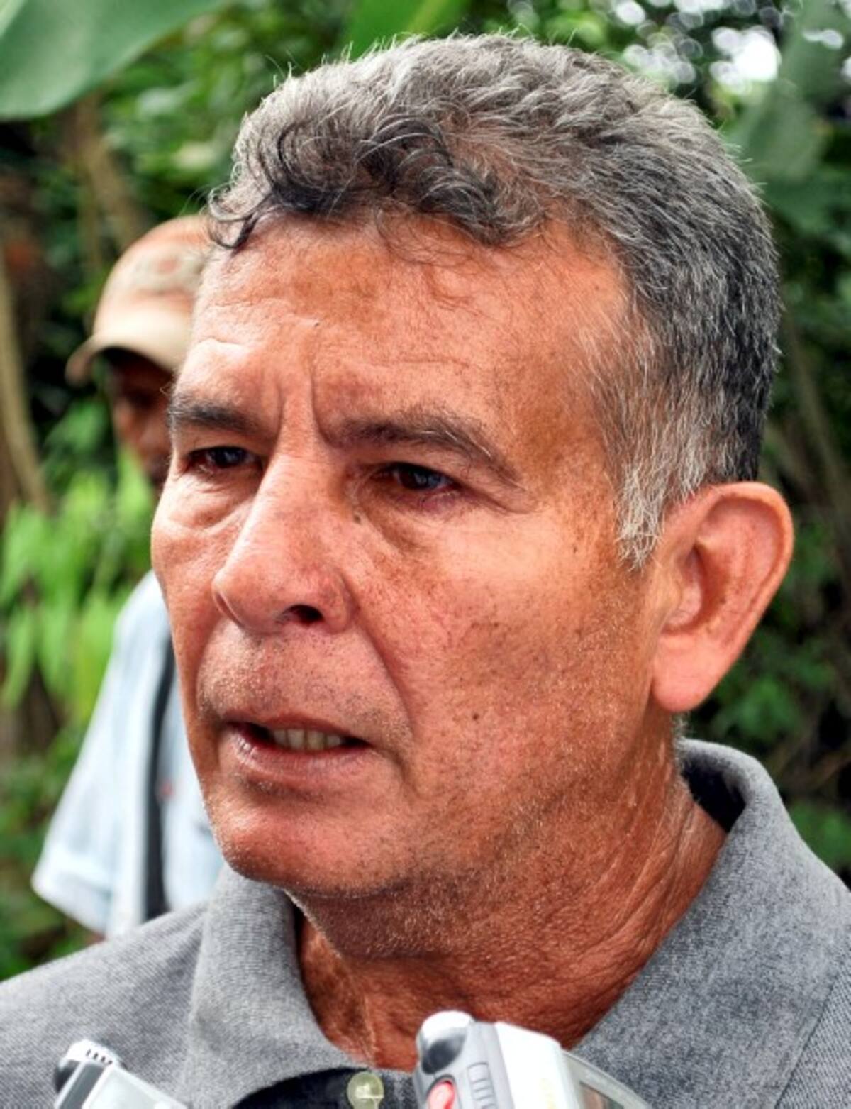 El padre de Juan Carlos Tuirán, uno de los muertos.
