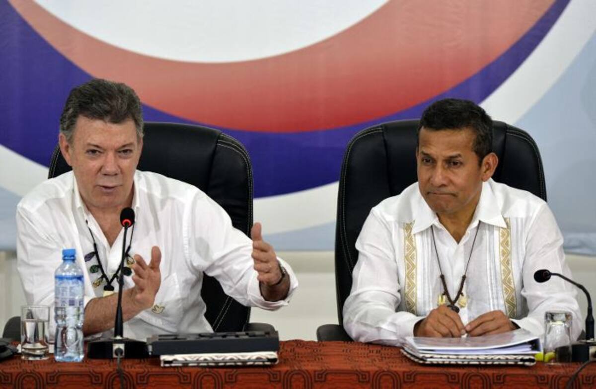 Juan Manuel Santos y Ollanta Humala. AFP CRIS BOURONCLE